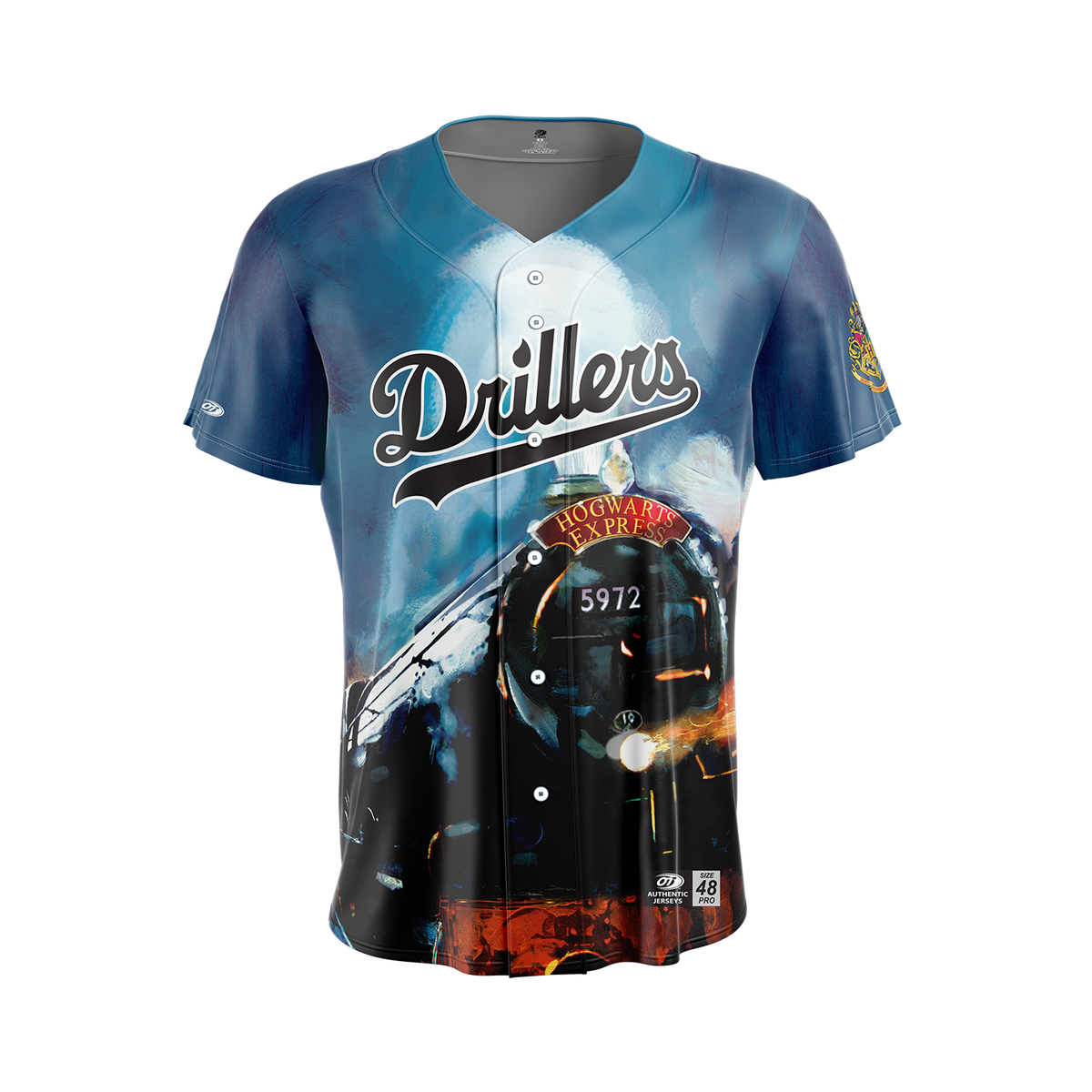 A short-sleeve baseball-style jersey with a blue gradient background and a large printed graphic of a black steam locomotive. The word "Drillers" appears across the chest in stylized lettering, with additional graphic text and small logos near the lower front.