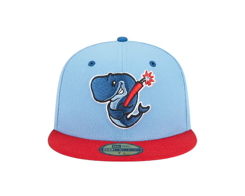 A fitted, baby blue and red cap with an embroidered Exploding Whales mark on the front.