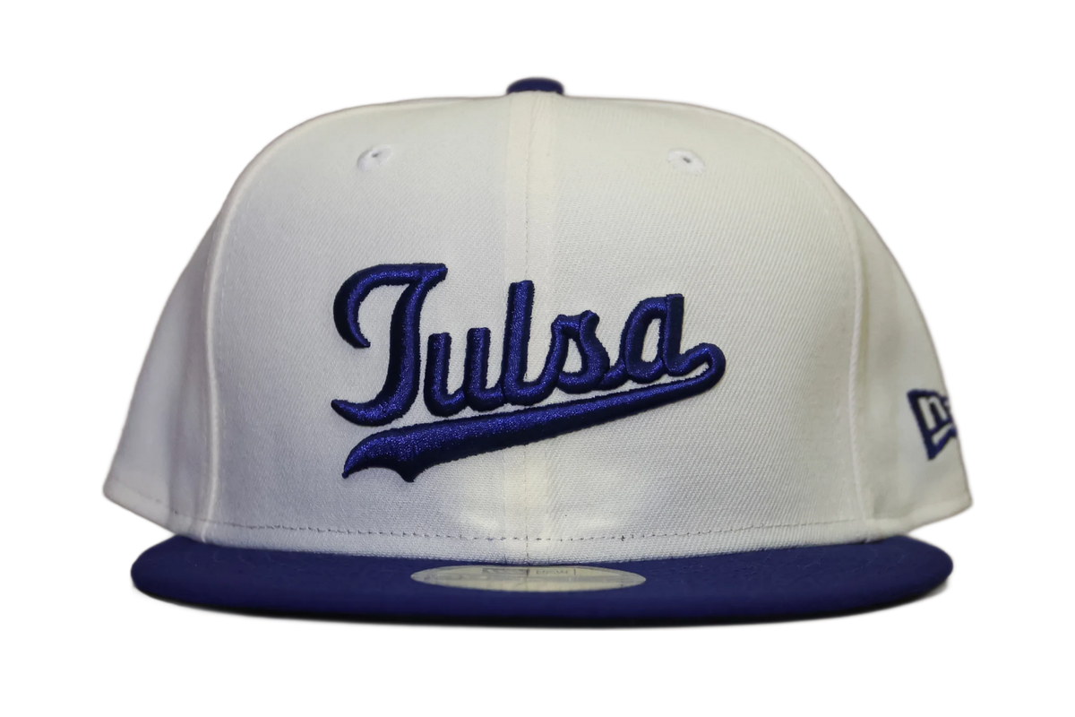 White and blue cap with 'Tulsa' text on a white background